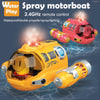 A yellow remote control spray motorboat with a propeller and LED lights is shown floating on water.