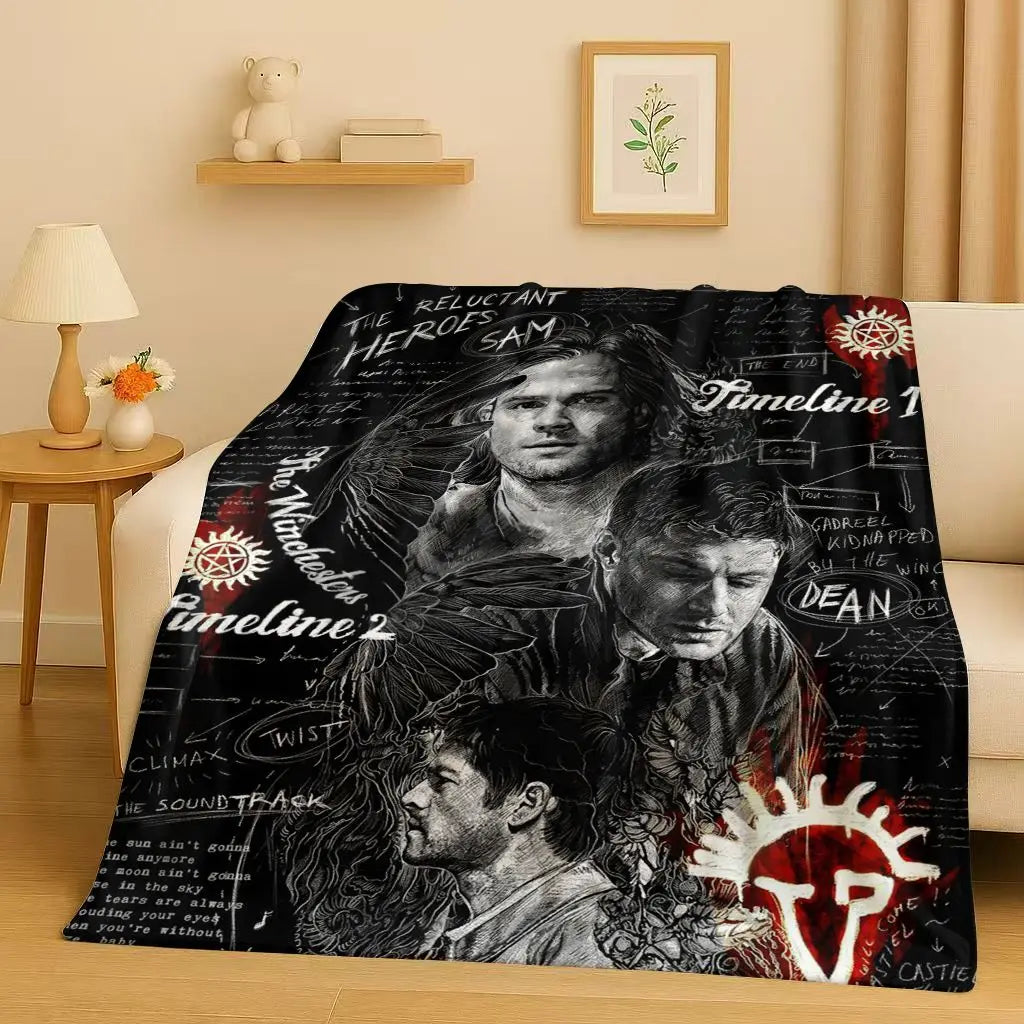 A black and white graphic blanket featuring characters from the Supernatural TV show Timeline 1 and Timeline 2