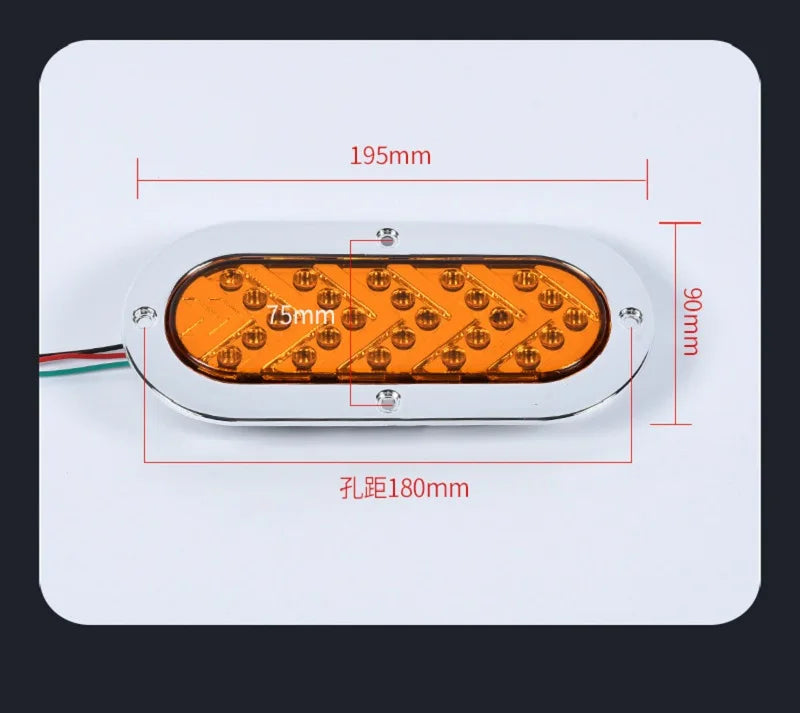 An oval LED trailer tail light with a dynamic amber arrow turn signal mounted on a white plate.