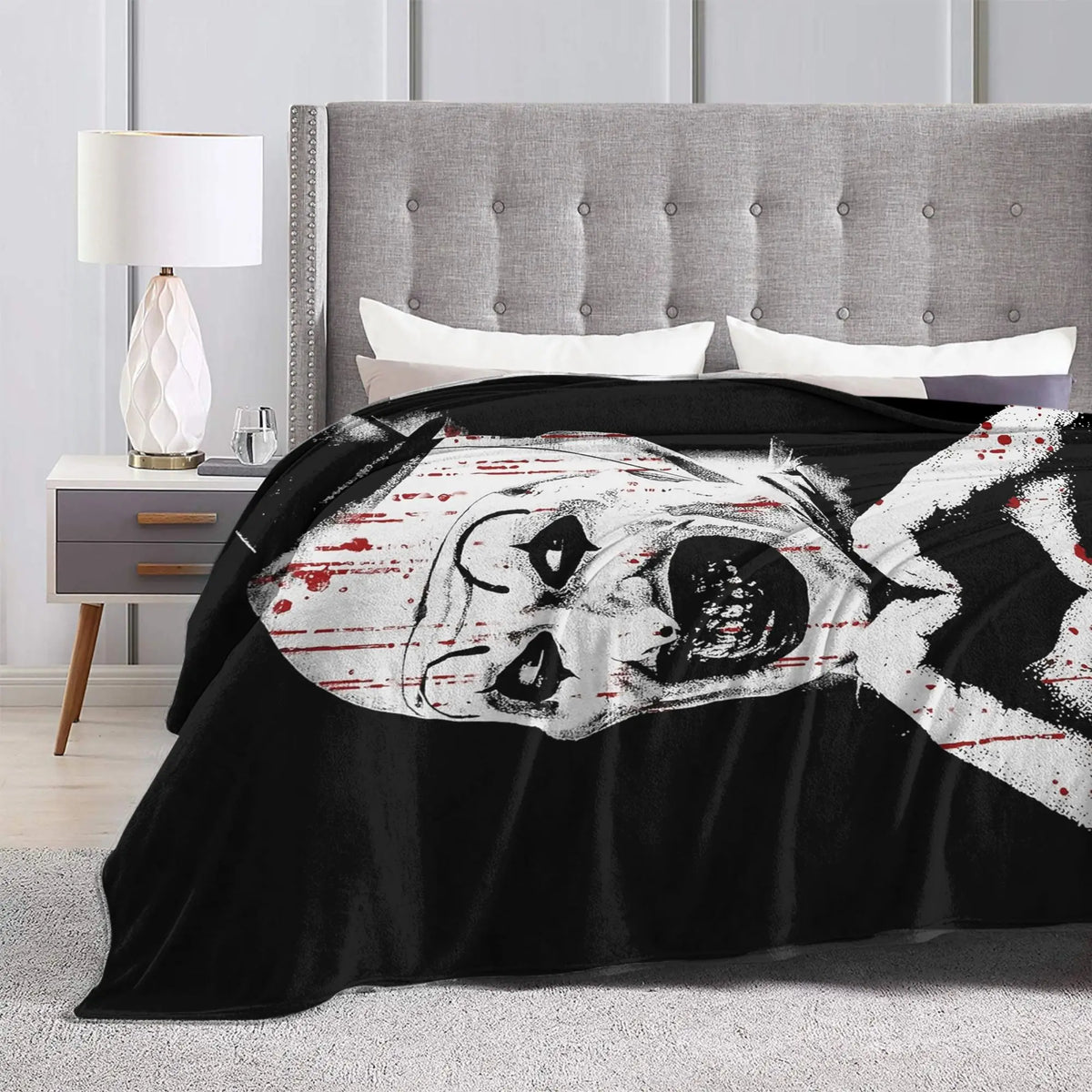 Black coral fleece throw blanket featuring a vintage art clown face design
