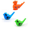 Three plastic novelty bird whistles in orange, blue, and green.