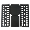 A black portable clothes folding board with multiple circular holes for hanging laundry.
