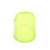 A lime green portable disposable soap tablet container.