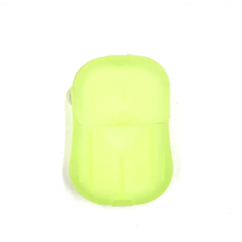 A lime green portable disposable soap tablet container.