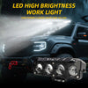 A close-up view of a high-intensity LED spotlight headlight mounted on an off-road vehicle.