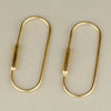 A pair of brass gold keychain charms with secure carabiner clips.