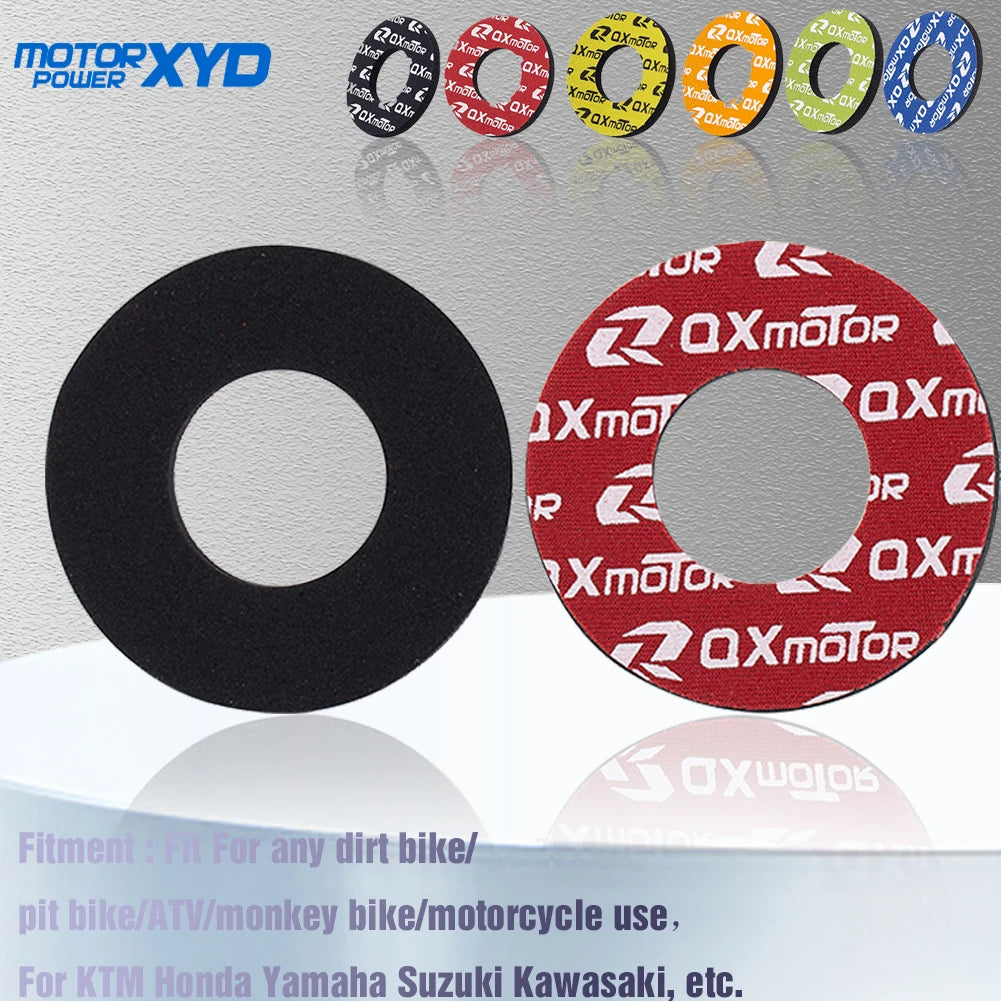 A pair of black and red checkered handlebar grips for dirt bikes and motorcycles.
