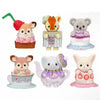 A collection of Sylvanian Families tea party baby figures featuring various animal characters like a fox, bear, and rabbit.