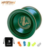 A green metal yoyo with a shark design and several colored silicone bearings are displayed.