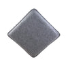A square, gray needle felting mat for wool crafting.
