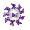 A collection of ten purple and black monarch butterfly magnets and adhesive decor