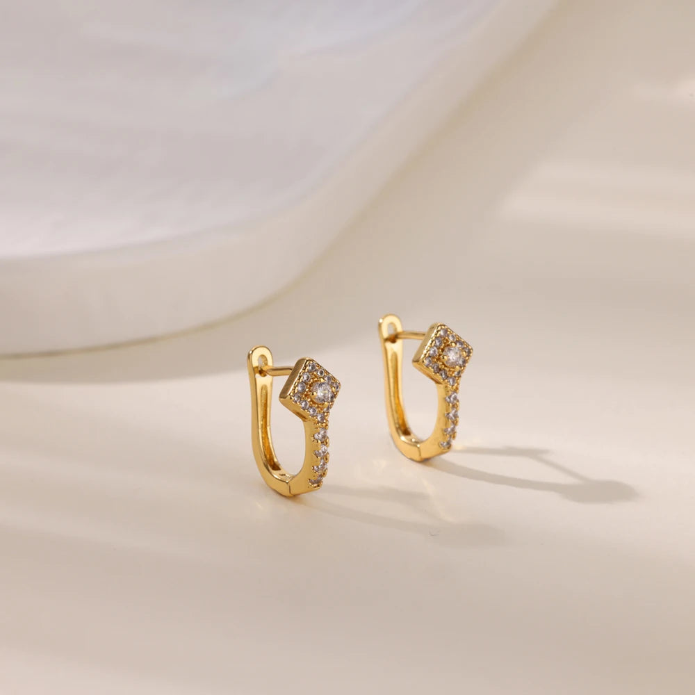 Boucles d'oreilles créoles en zircon cubique ton or