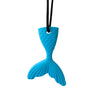 A bright blue silicone sensory chew necklace pendant shaped like a fish for a child.