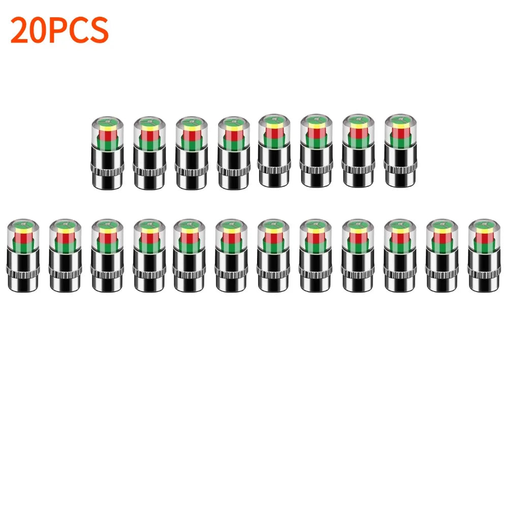 A set of four color-coded tire pressure indicator valve caps shown in a row.