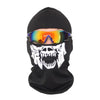 Black full face balaclava with a white skull print and mirrored orange-yellow visor