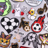 A collection of embroidered iron-on patches featuring funny cartoon animals like cats, rabbits, and geese.