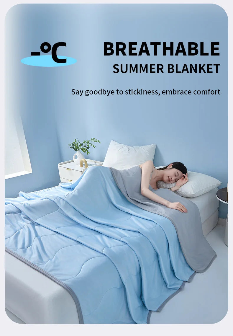 A light blue breathable summer blanket is draped over a person lying on a bed, emphasizing comfort.