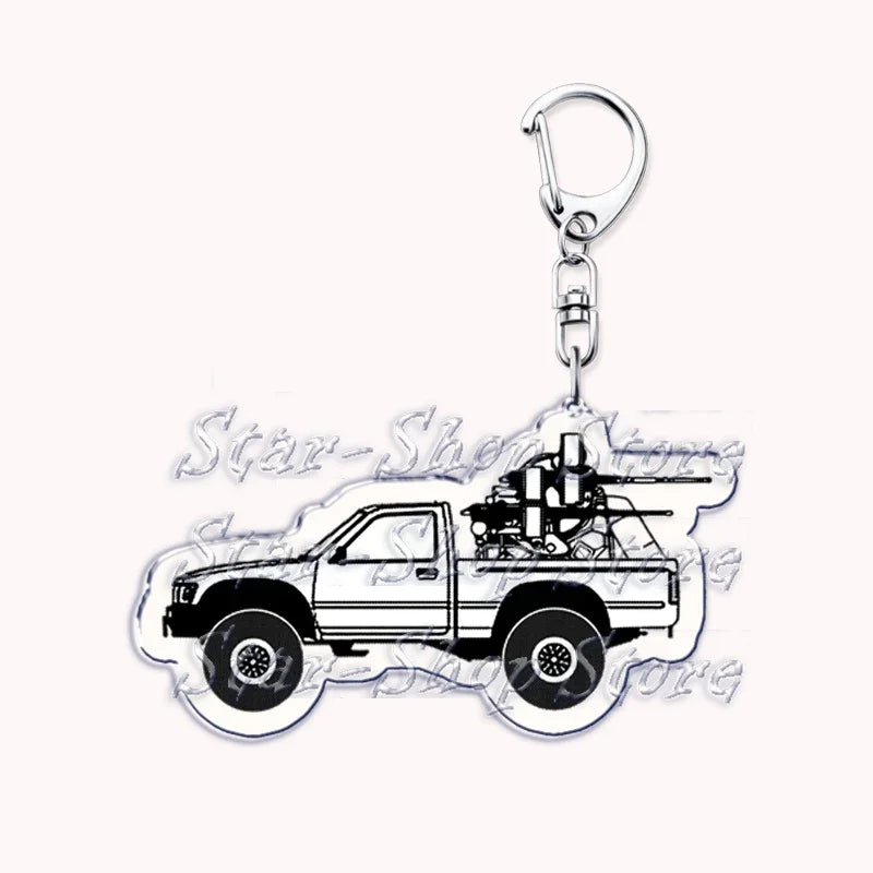 A silver metal key ring attached to a durable keychain featuring an off-road truck silhouette.