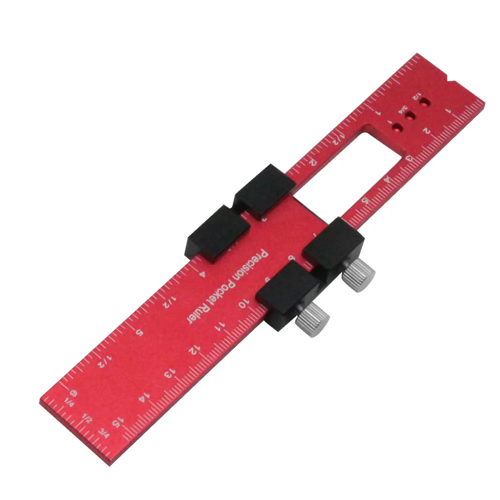 A red aluminum pocket ruler with a T-track slide stop and markings.
