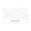 A white card with colorful confetti scattered across it and the text THANK YOU!