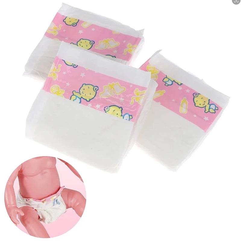A set of pink and yellow fabric accessories including a jumpsuit, hat, and socks for an 18-inch doll.
