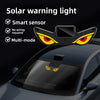 Solar warning light featuring a smart sensor and multi-mode function installed on a car window.