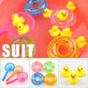 A collection of yellow rubber duck bath toys in various colors and shapes, including a pink bowl and several floating ducks.