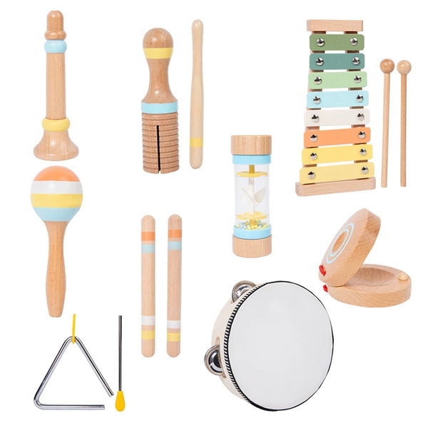 A set of wooden percussion instruments including a mallet, drumsticks, and a tambourine.