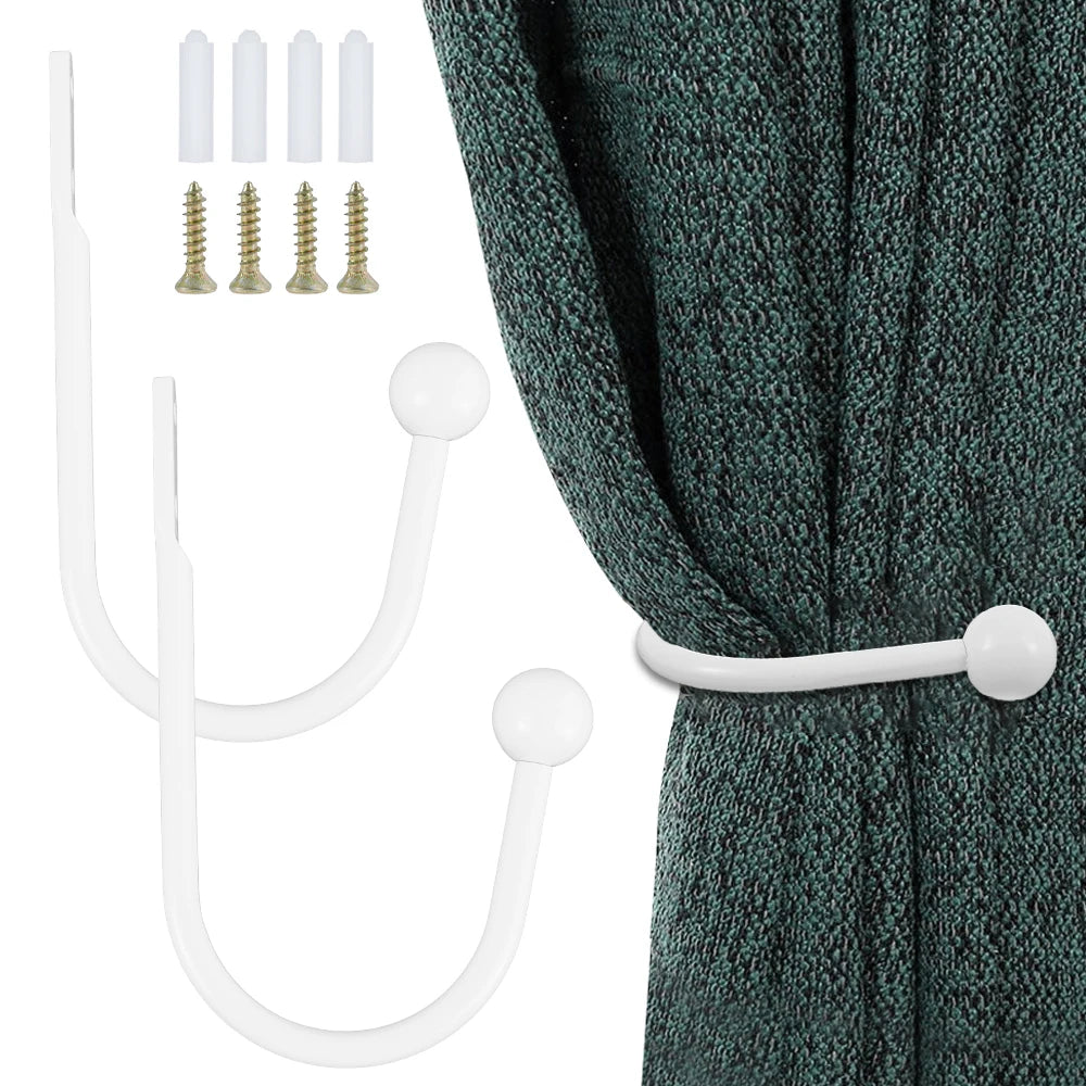 White retro iron curtain tieback hooks with U-shaped holders and screws shown next to a teal fabric.