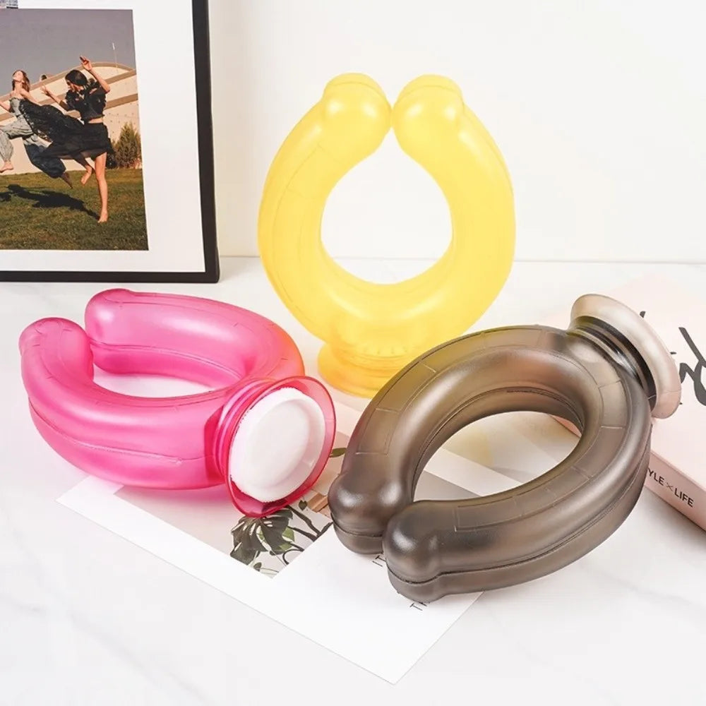 Three reusable U-shaped neck wraps in pink, yellow, and brown resting on a white surface.