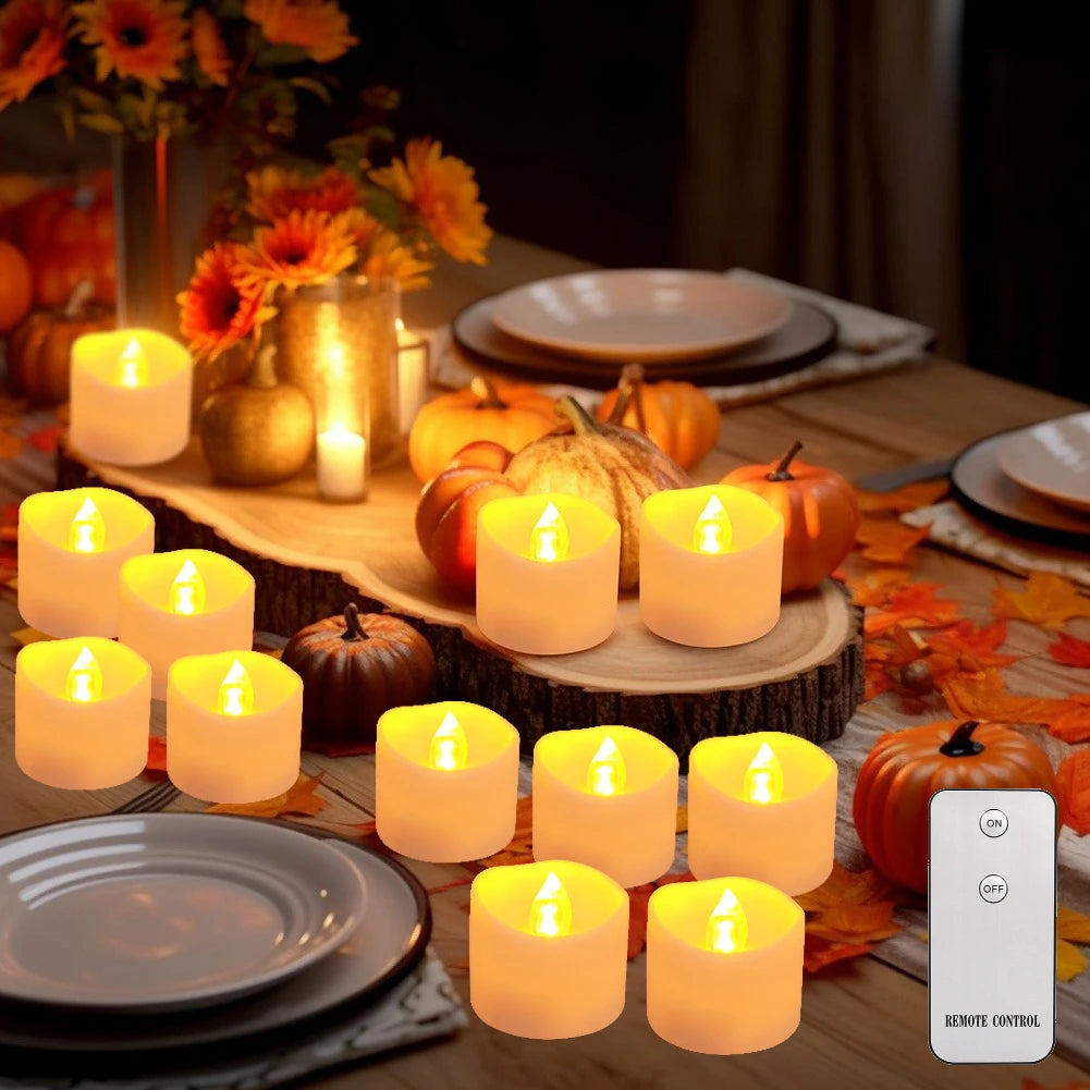A set of glowing orange LED tea light candles arranged on a wooden surface with pumpkins and autumn leaves.