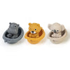 Three silicone animal finger puppets, including a gray elephant, yellow lion, and beige elephant, in small bowls.