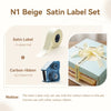 Set of beige satin label rolls and a carbon ribbon for N1 label printer