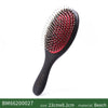 Black boar bristle hair brush with red bristles and a wooden handle