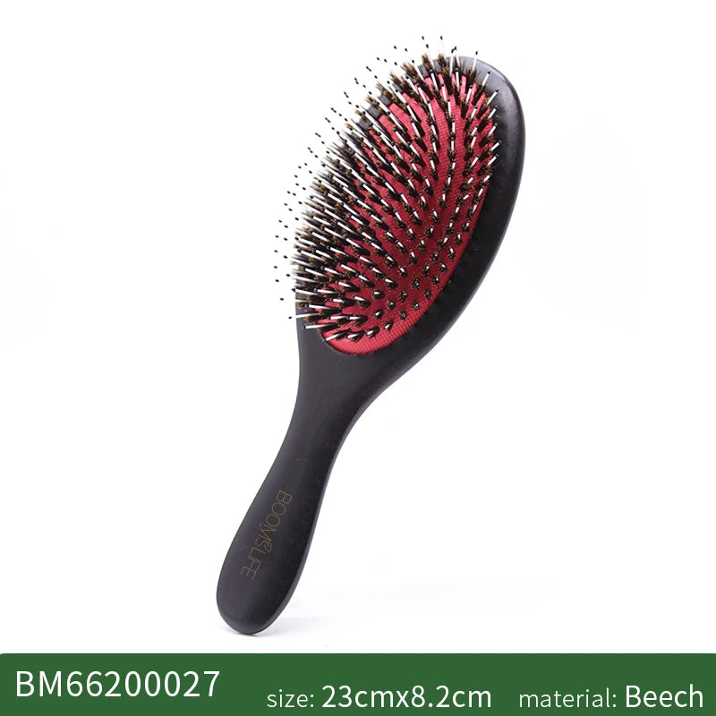 Black boar bristle hair brush with red bristles and a wooden handle