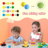 A child is playing with a colorful clay set featuring various colors and modeling tools.
