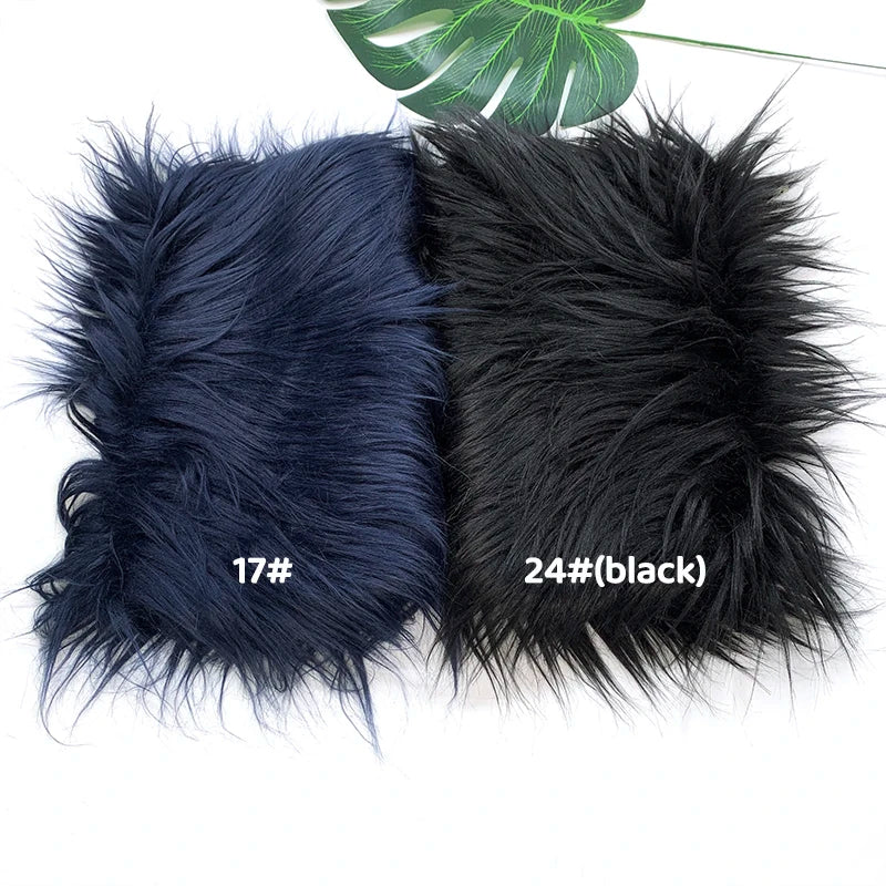 Two pieces of soft faux fur fabric, one dark blue and one black, displayed for DIY sewing or cosplay.