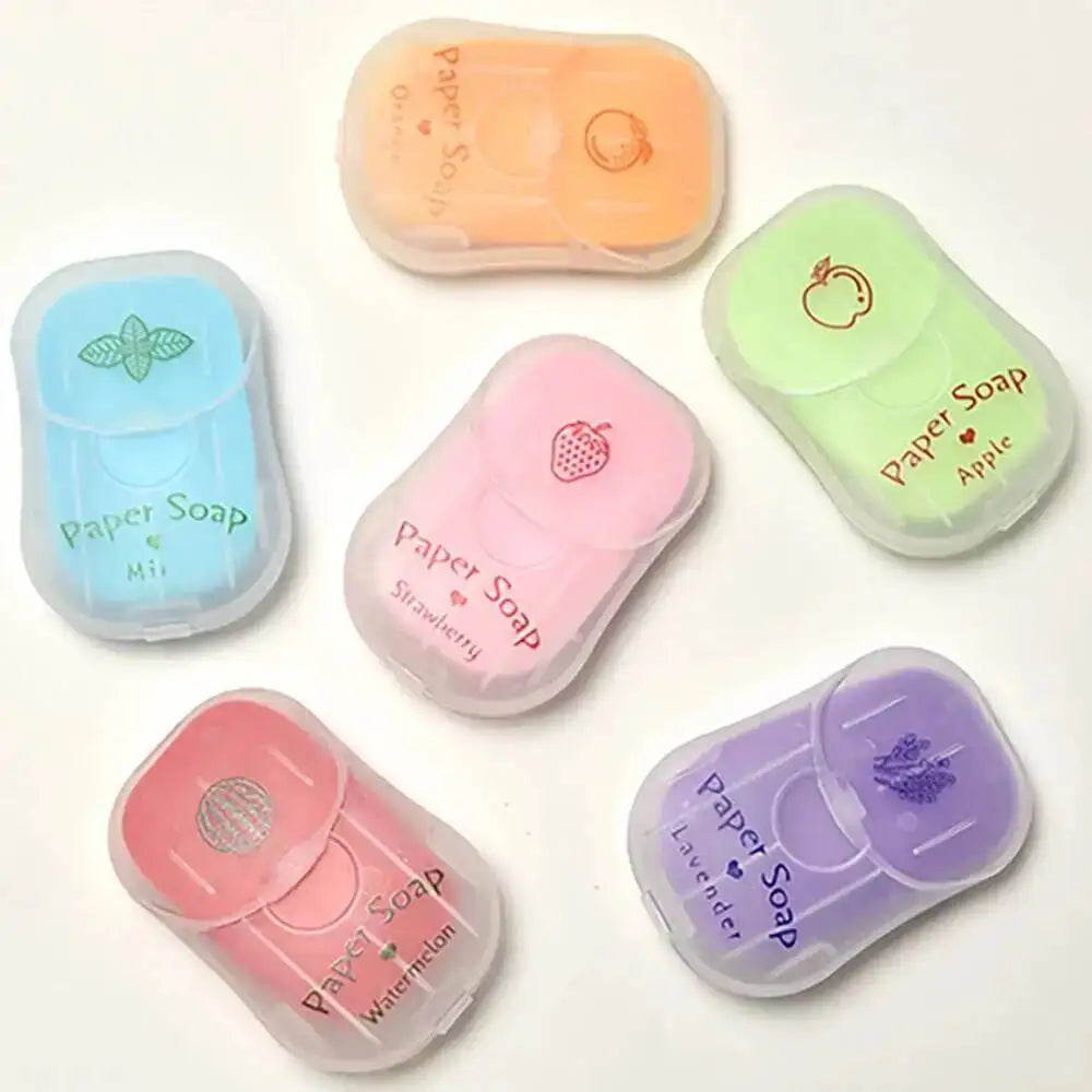 A collection of various colored, translucent paper soap sheets in plastic containers.