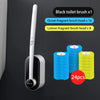 A set of black toilet brushes and various scented brush heads including ocean and lemon fragrances.