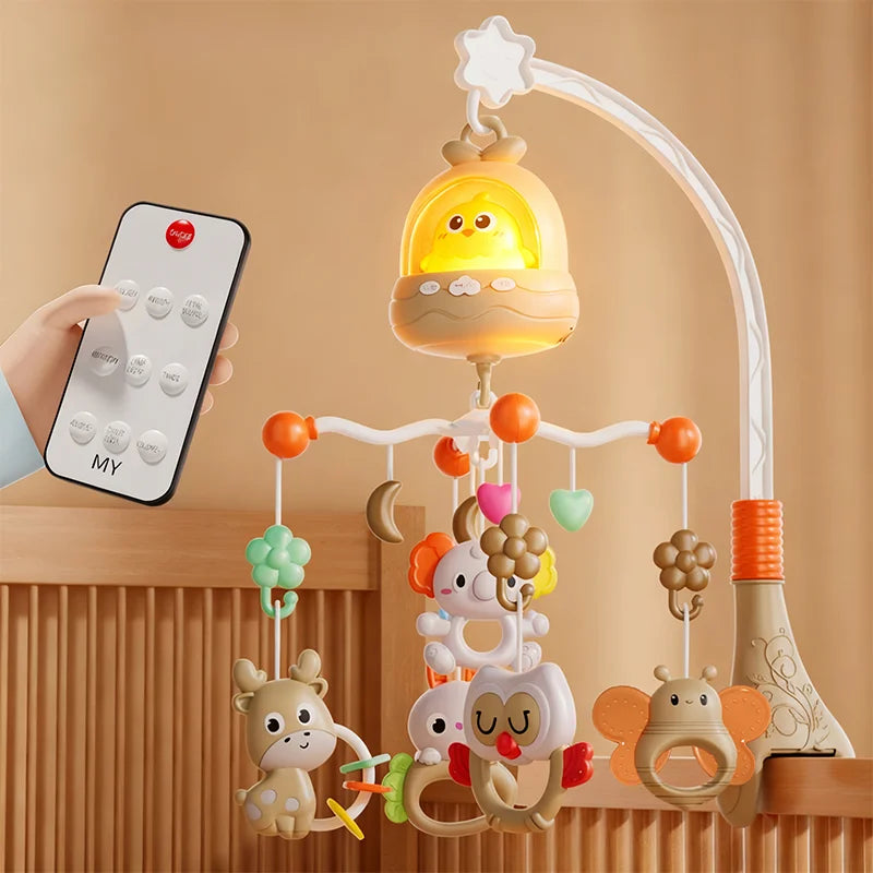 A musical crib mobile featuring a glowing rattle and various animal charms suspended from a curved arm.