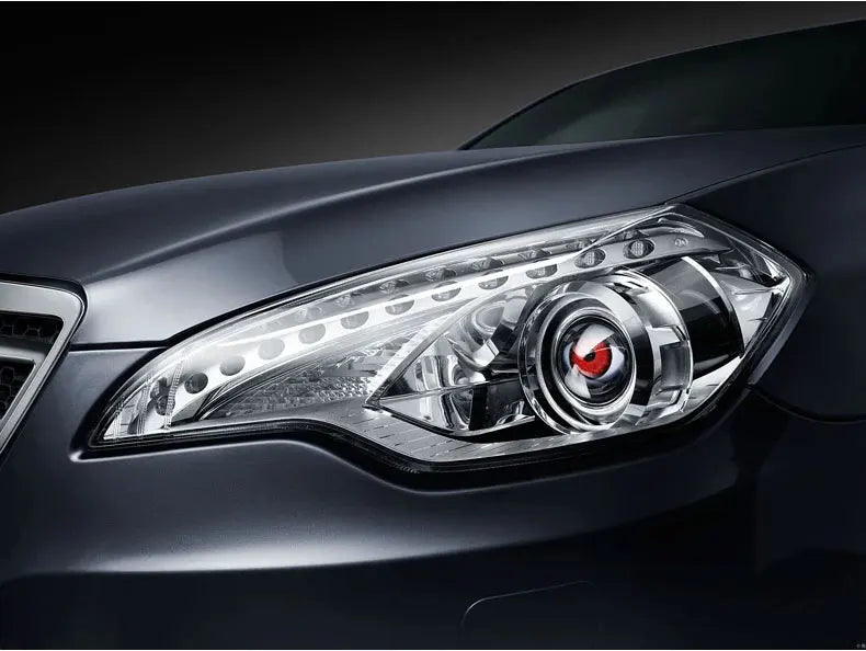 Close-up of a silver car's headlight featuring a 3-inch dynamic devil eye LED light.