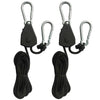 A pair of black rope tensioners with metal ratchet pulley hooks and thick black cord.