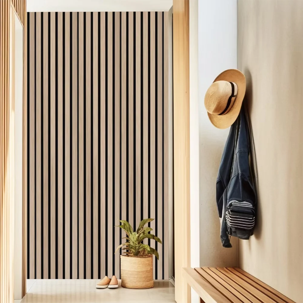 A close-up of a vertical wood slat wall panel installation next to a wooden shelf and a hanging dark blue jacket.