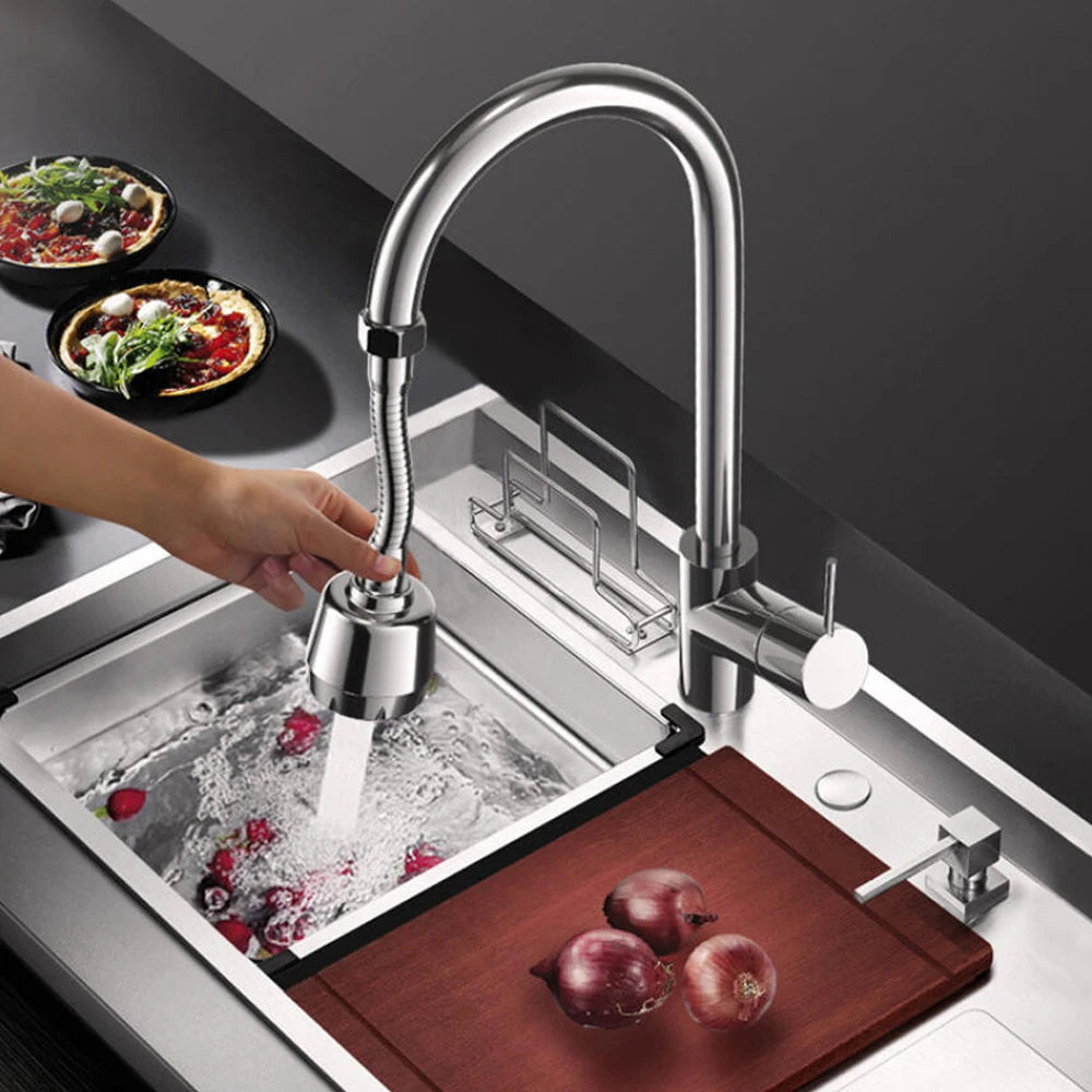 A modern stainless steel kitchen faucet is shown dispensing water into a sink, with fresh ingredients nearby.