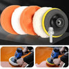 A set of six orange and white car polishing pads with a drill adapter shown being used on a car surface.