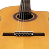 Close-up view of a classical guitar showing the bridge and strings.