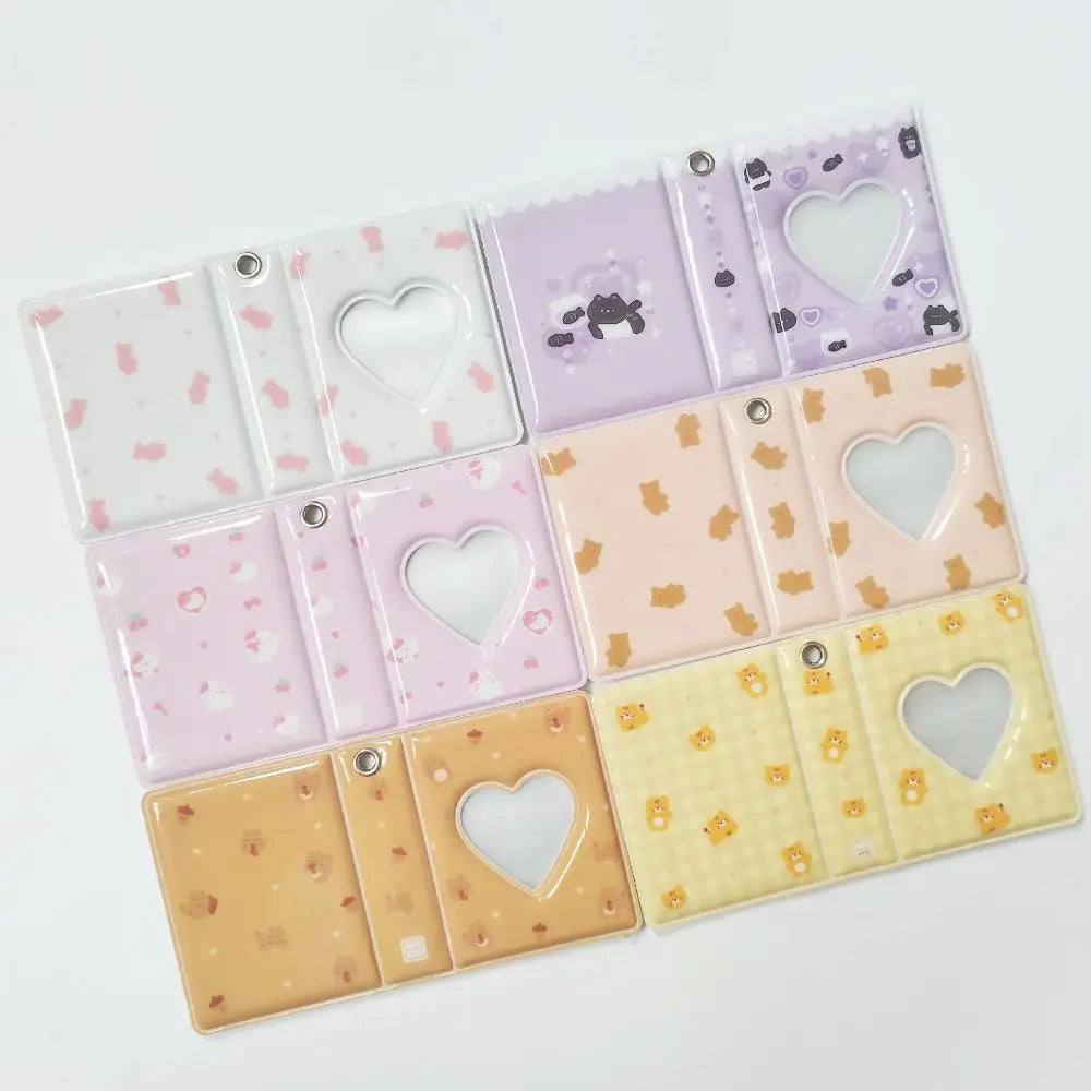 A set of clear photo album pages with heart cutouts featuring various pastel colors and cute animal designs.