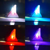 Four views of a solar-powered shark fin antenna with an LED safety light reflecting on a surface.