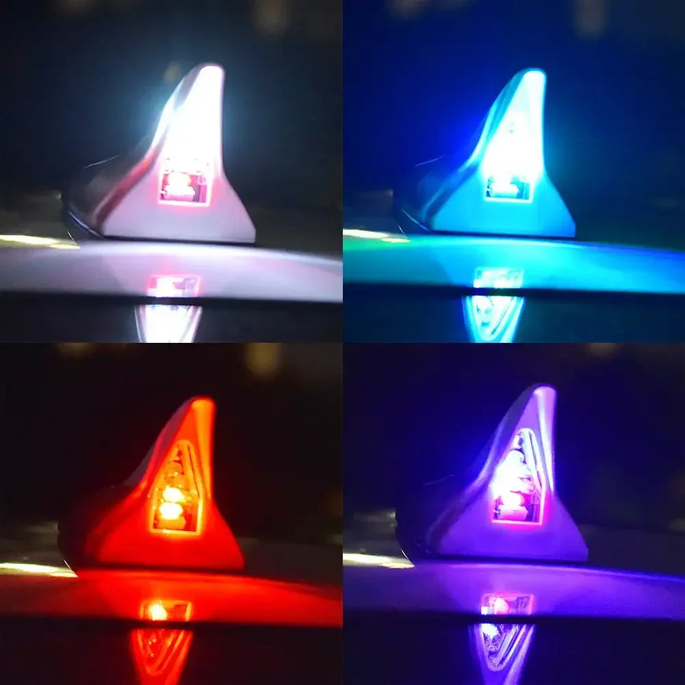 Four views of a solar-powered shark fin antenna with an LED safety light reflecting on a surface.