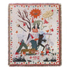 A woven throw blanket featuring a colorful, stylized illustration of a tree, animals, and floral elements on a light backgrou